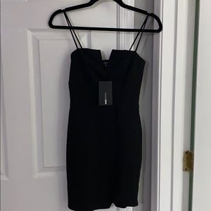 Little black dress with high slit